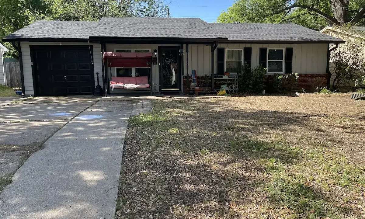 Asphalt Shingle Roof Repair crew at work on a residential roof in Land O' Lakes